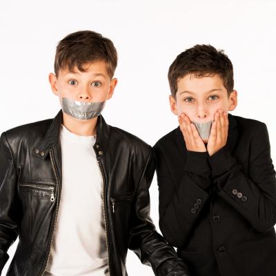 Two Children with tape over their mouths!